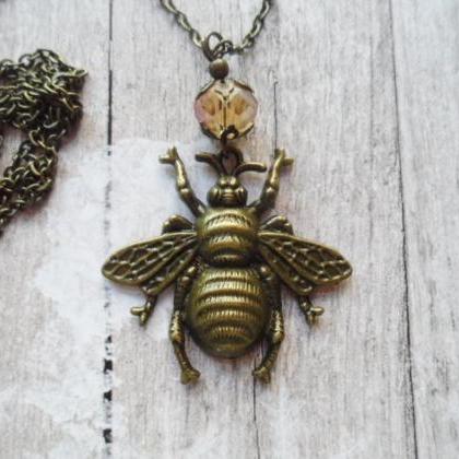 Bee Necklace With Champagne Glass Pearl Adorned..
