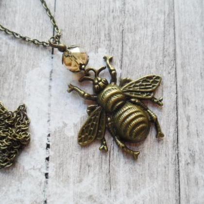 Bee Necklace With Champagne Glass Pearl Adorned..