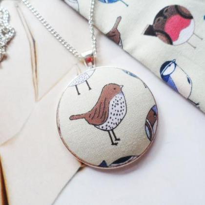 Scandinavian Bird Necklace With A Cotton Fabric..