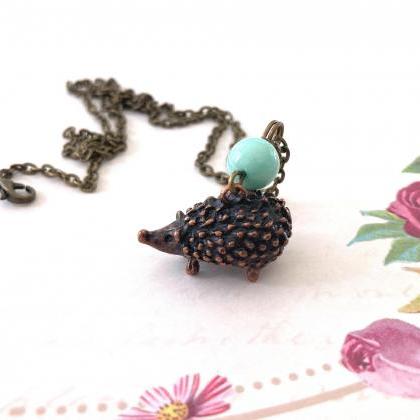 Adorable Hedgehog Necklace With A Pale Green Jade..