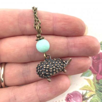 Adorable Hedgehog Necklace With A Pale Green Jade..