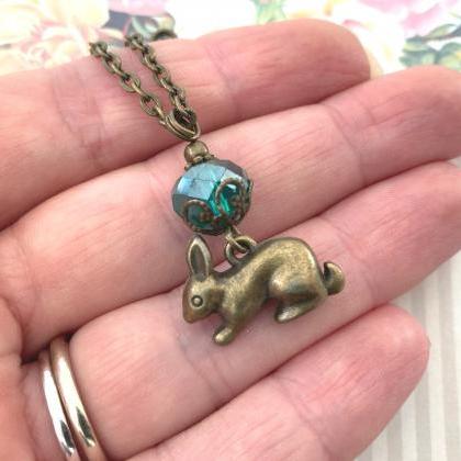 Adorable Bunny Rabbit Necklace With A Teal Glass..