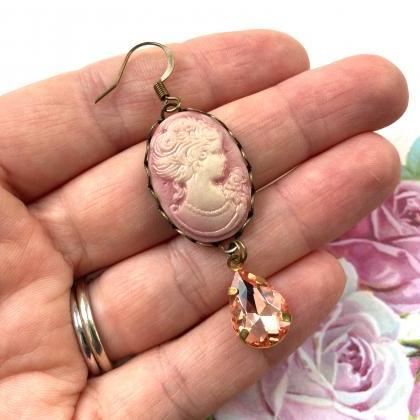 Lovely pink cameo earrings with gla..