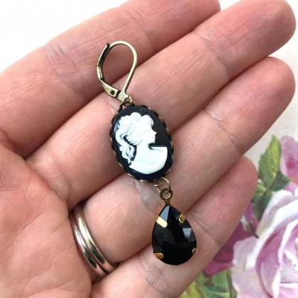 Cameo earrings with black glass pen..