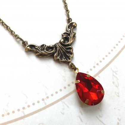 Art Nouveau necklace with a rubby r..