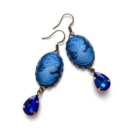Lovely blue cameo earrings with gla..