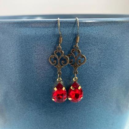 Art Nouveau earrings with red glass..