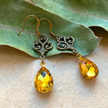 Art Nouveau Earrings With Yellow Glass Pendants,..