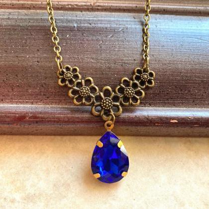 Floral Necklace With A Blue Glass Pendant, Selma..