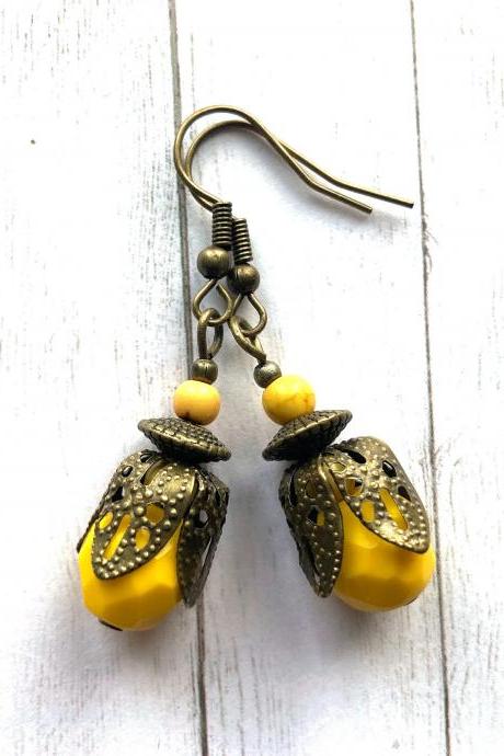 Moroccan style brass earrings with yellow glass beads, Selma Dreams