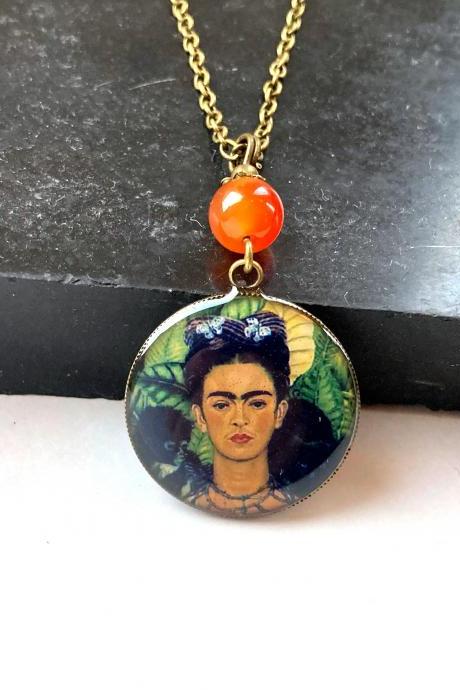 Bohemian brass necklace with a Frida Kahlo pendant and an orange carnelian pearl, Selma Dreams