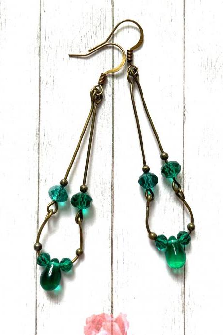 Beautiful brass earrings with shimmering teal glass beads, Selma Dreams