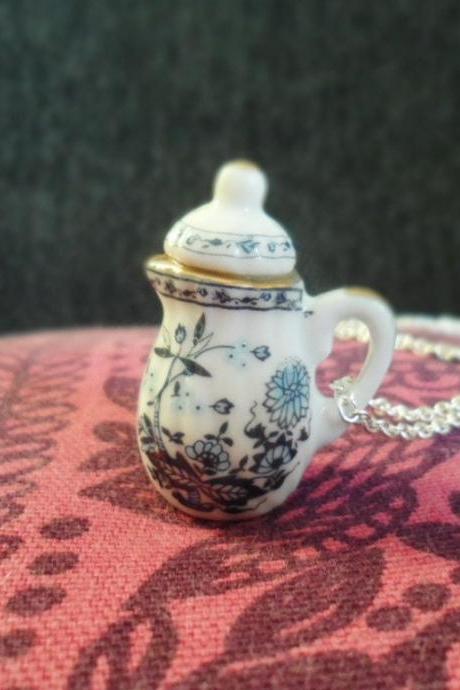Whimsical silver plated necklace with a porcelain blue flower teapot pendant, Selma Dreams