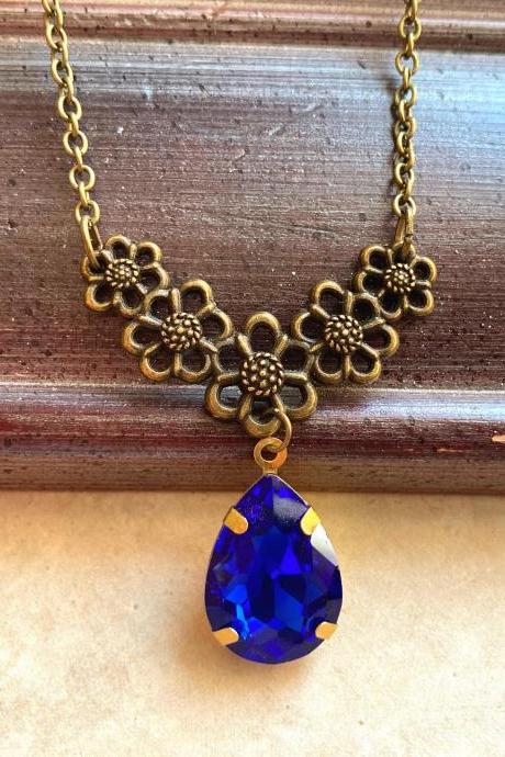Floral Necklace With A Blue Glass Pendant, Selma Dreams
